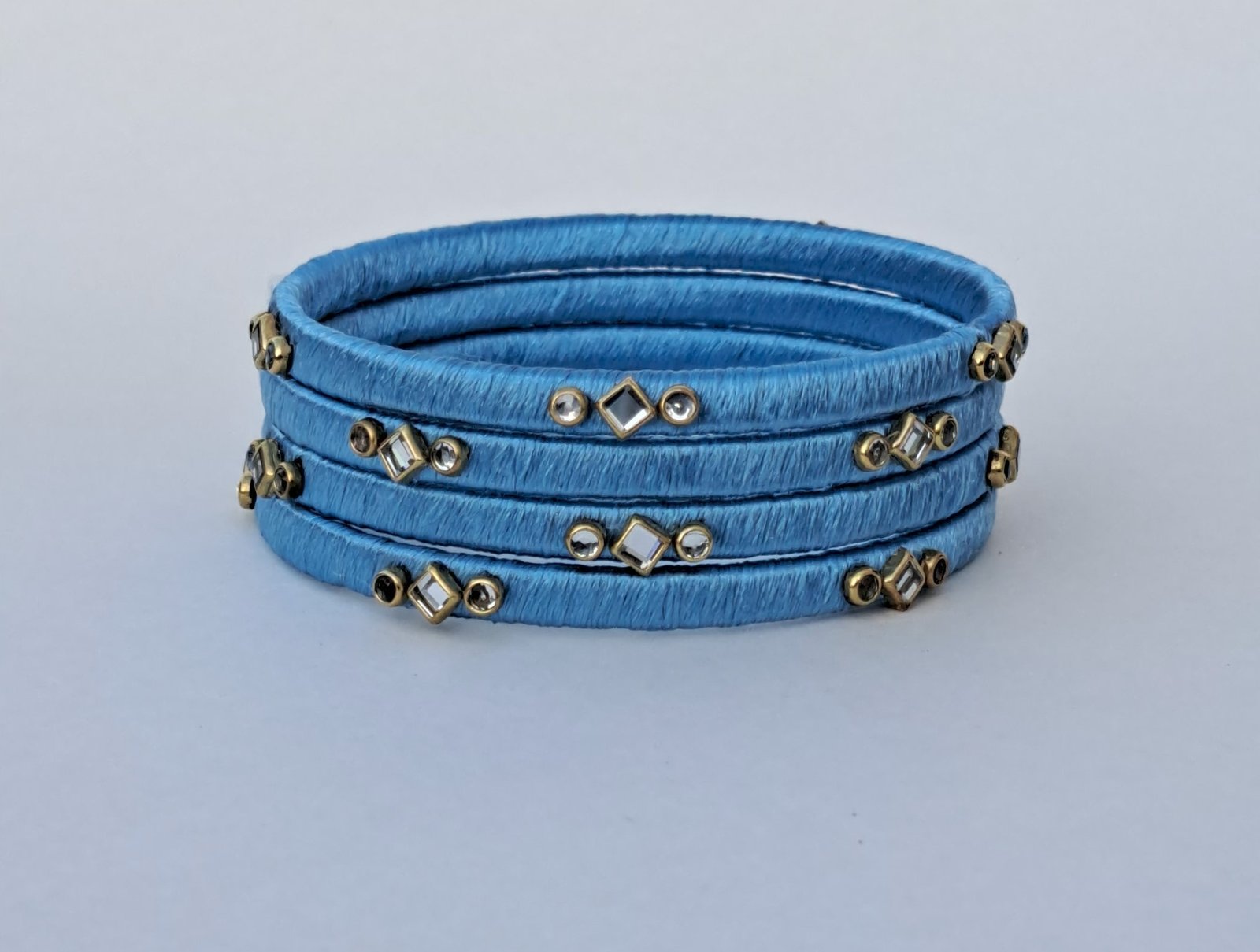 Handcrafted Sky Blue Silk Thread Kundan Bangles (Set of 4)
